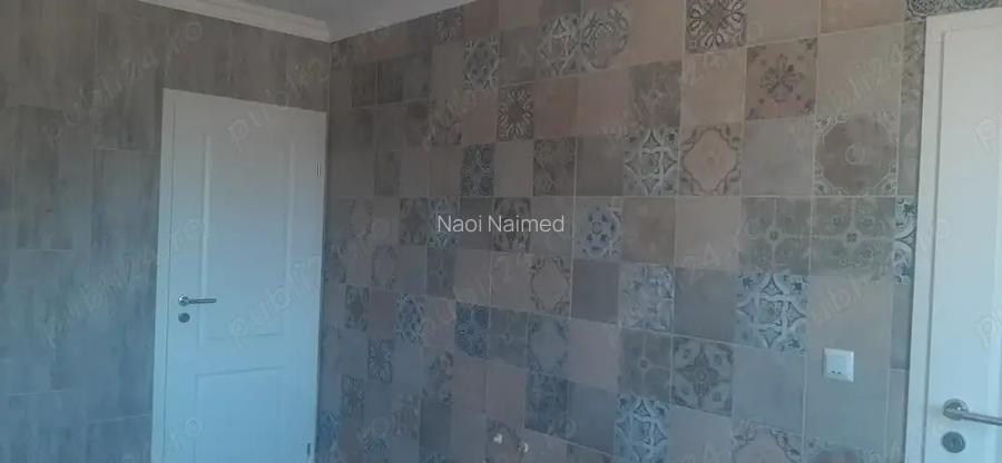 Vand Casa an Gri cu Gradina