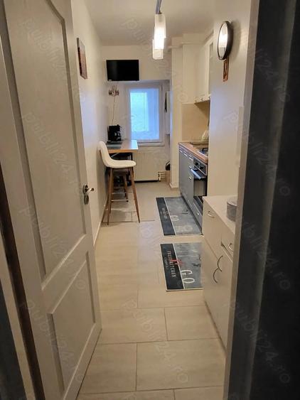 vind apartament cu o comera 44mp ,etaj intermediar ,zona Nord - 7