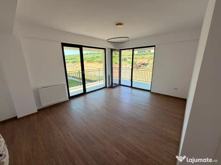 Apartament cu 3 camere decomandat în Bucium