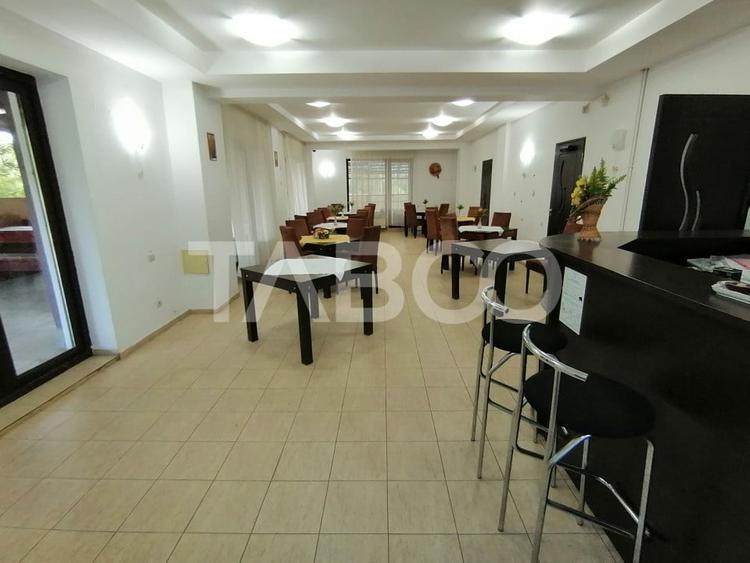 Pensiune 13 camere 16 bai sauna piscina si teren 1565 mp Cisnadioara - 37