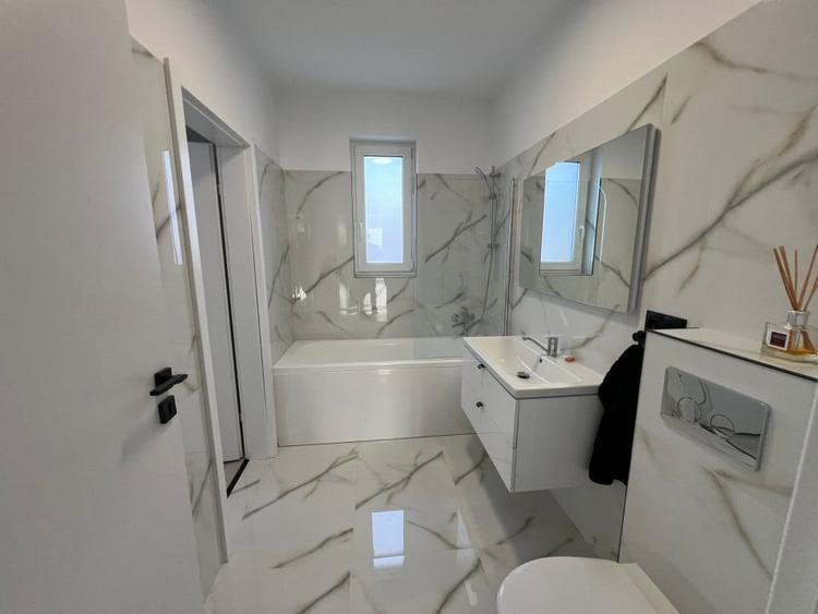 Apartament  cu 3 camere,2bai si 2 parcari - 13