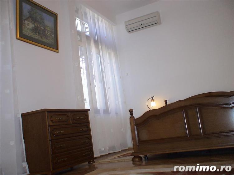 Ofer spre inchiriere ap.2 camere decomandat parter din p+2,mobilat,cu centrala proprie,central,63mp - 4