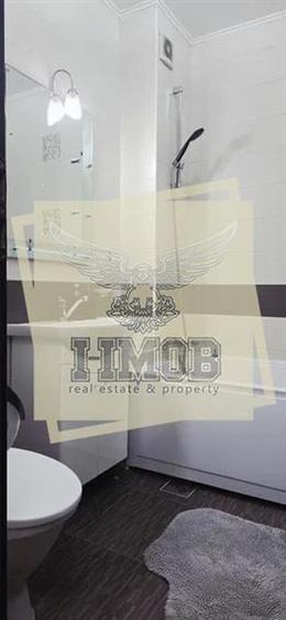 Apartament cu 3 camere semidecomandat, mobilat în Central