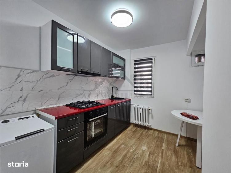 Apartament cu 2 camere semidecomandat, mobilat în Podu Roș