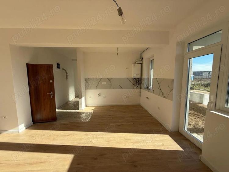 Ap 3 cam - 68 mp utili - curte 46 mp utili de vanzare - 9