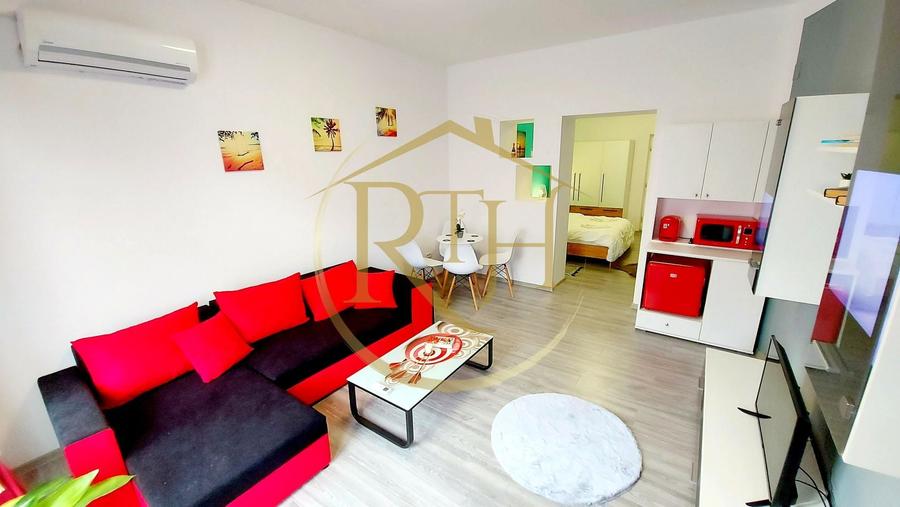Apartament cu 2 camere semidecomandat, mobilat în Central
