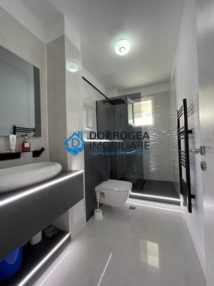 Apartament cu 3 camere decomandat în E3