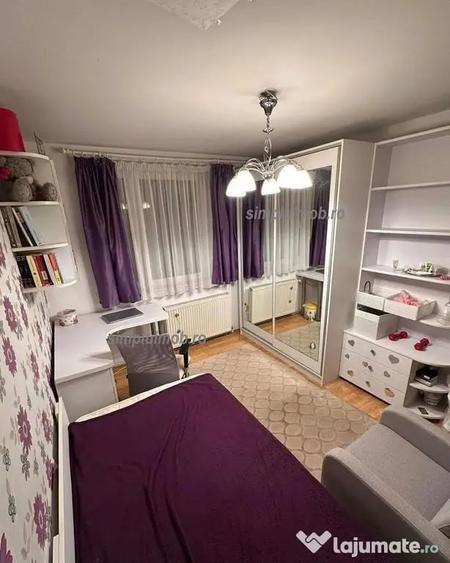 Apartament cu 4 camere decomandat în Titan