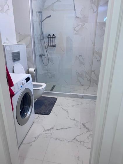 Apartament cu 2 camere semidecomandat, mobilat în Central