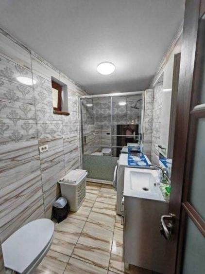 Casă individuală cu 4 camere cu Canalizare în Coiciu