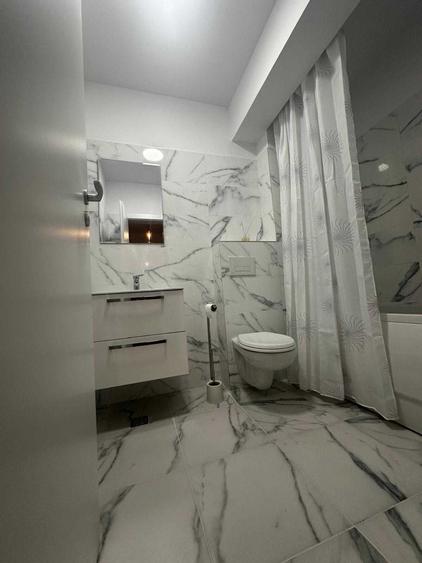 Apartament cu 2 camere decomandat în Cățelu