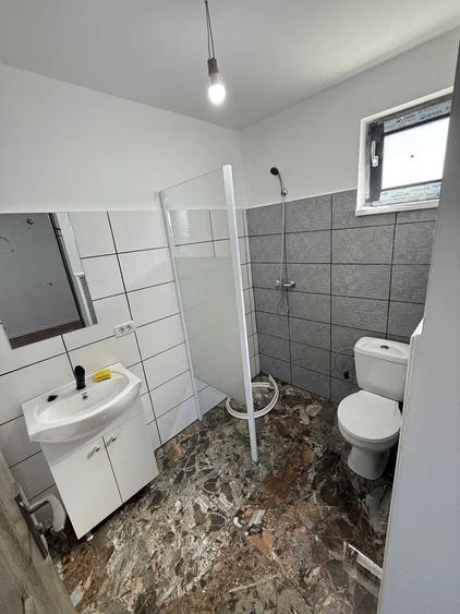 Casă cu 4 camere în Tomești