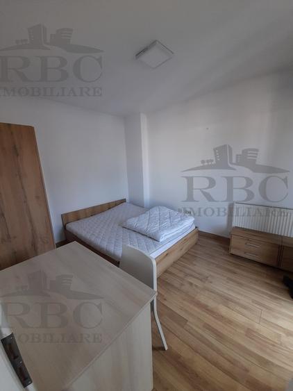 Apartament cu 3 camere semidecomandat, mobilat în Central