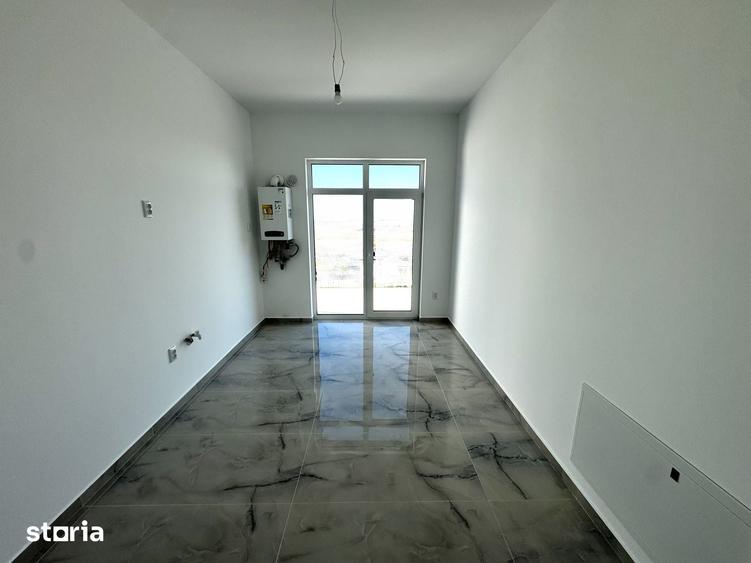 Casă cu 4 camere cu Teren 640 Mp în Tomești