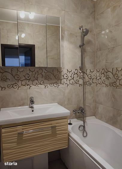 Apartament cu 3 camere în Romană