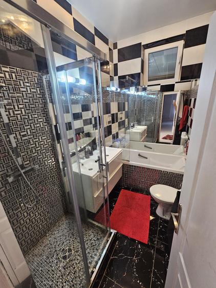 Apartament cu 4 camere decomandat în Central