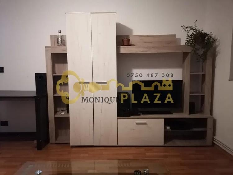 Apartament cu 2 camere semidecomandat, mobilat în Central