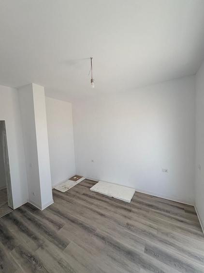 Apartament cu 3 camere semidecomandat, mobilat în Giroc