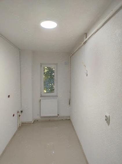Apartament cu 2 camere semidecomandat în Titu