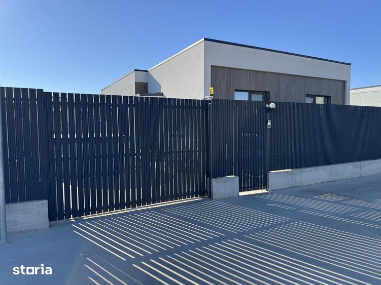 Casă cu 4 camere cu Teren 370 Mp în Tunari