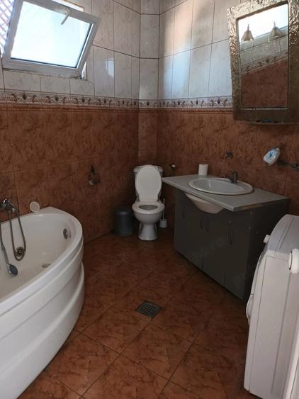 Casă cu Teren 1000 Mp în Central