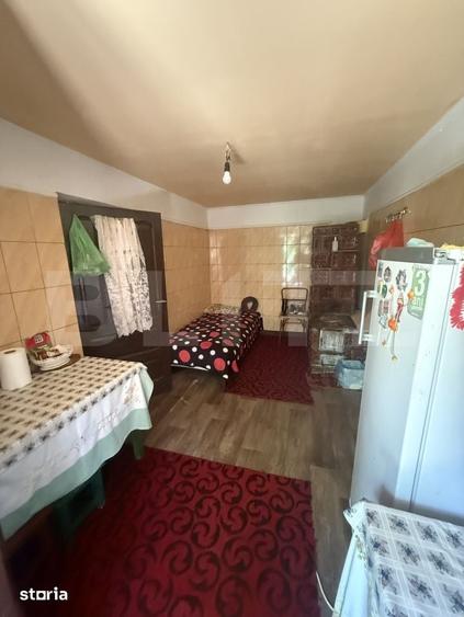 Casă cu 4 camere cu Teren 1000 Mp în Voinești