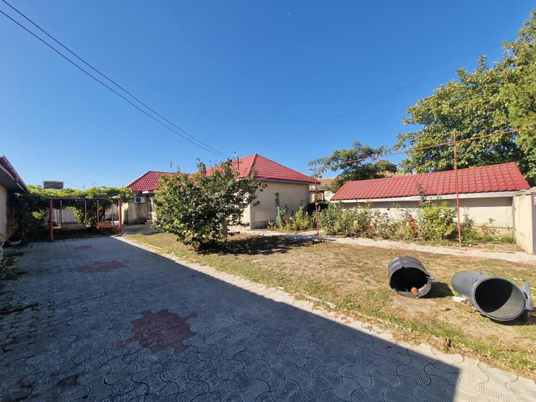 Casă cu 4 camere cu Garaj în Cogealac