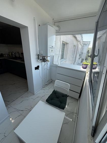 Apartament cu 3 camere decomandat în Buzaului