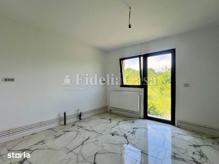 Casă cu 4 camere cu Teren 550 Mp în Voinești