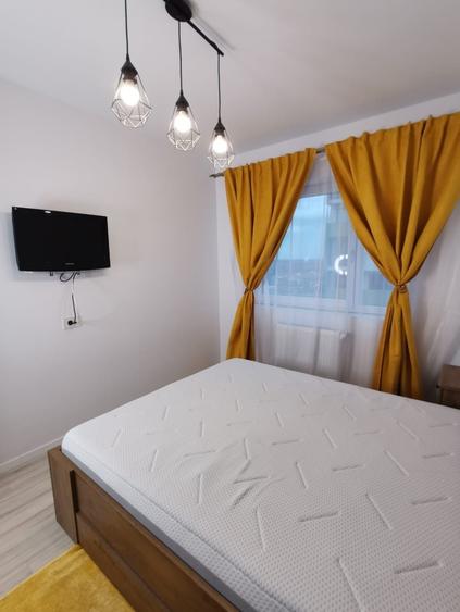 Inchiriez apartament doua camere cu loc de parcare Prima Onestilor - 6