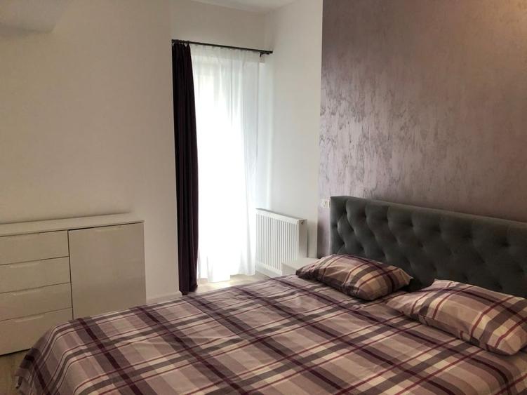Apartament cu 2 camere semidecomandat, mobilat în Central