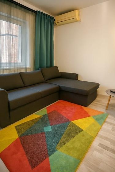 Apartament cu 2 camere semidecomandat, mobilat în Central
