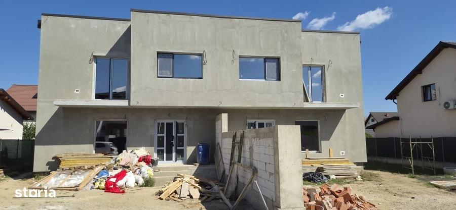 Casă cu 4 camere în Bascov