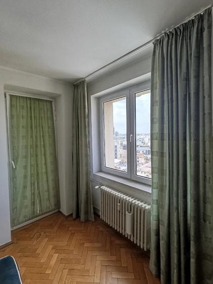 Apartament cu 3 camere semidecomandat în Cișmigiu
