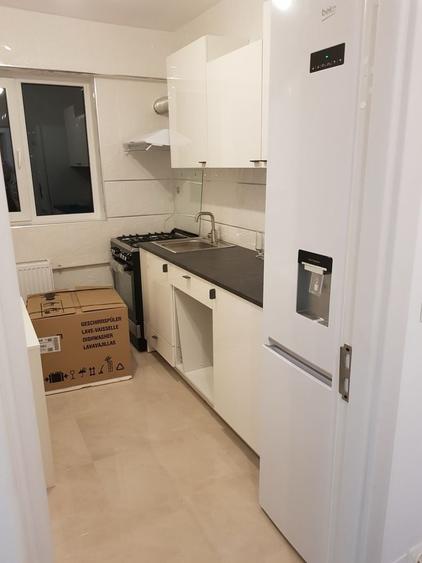 Apartament cu 3 camere semidecomandat în Central