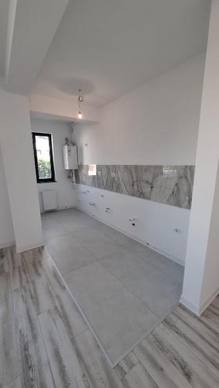 Apartament cu 3 camere decomandat în Kamsas