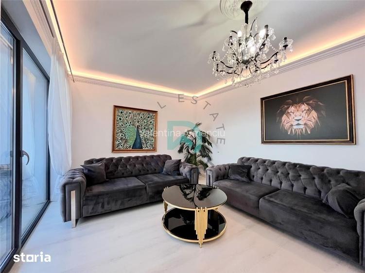 Apartament cu 3 camere de vanzare, 3 balcoane si 2 locuri de parc
