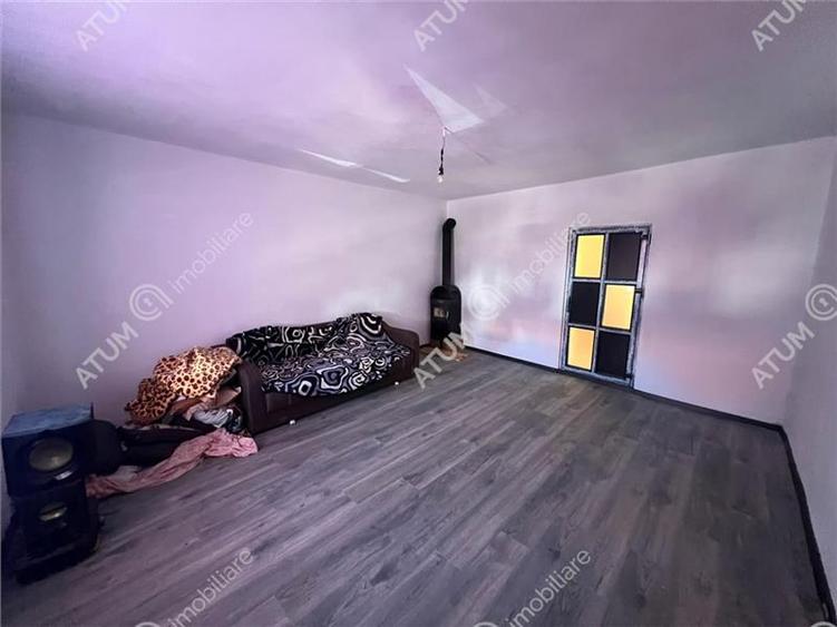 Casă individuală cu 5 camere cu Teren 489 Mp în Central