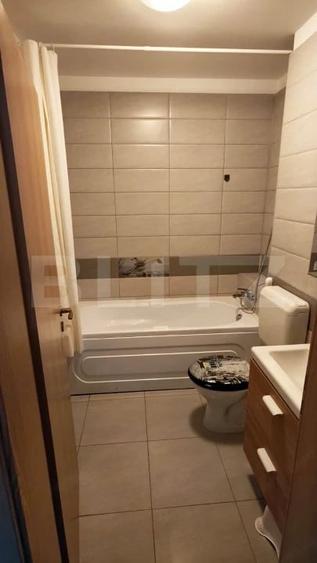 Apartament cu 2 camere decomandat în Tractorul