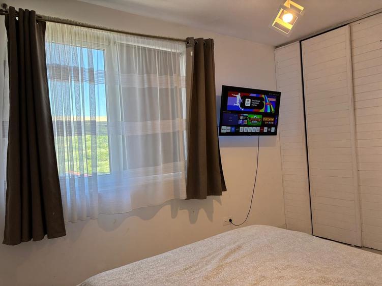 Apartament cu 3 camere semidecomandat, mobilat în Chinteni