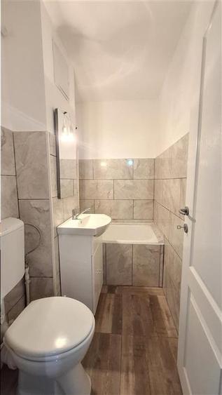 Apartament cu 3 camere semidecomandat în Alexandru cel Bun