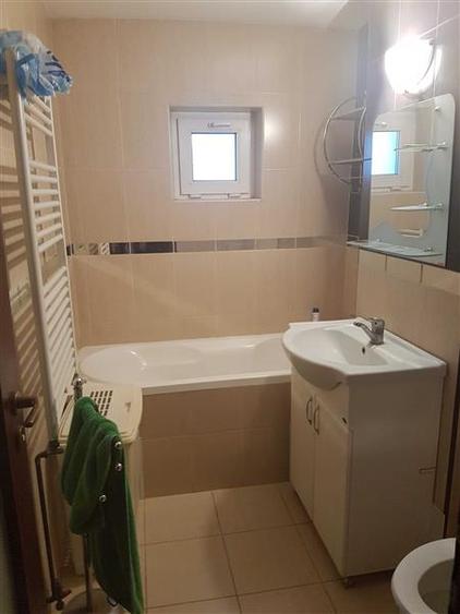 Apartament cu 2 camere semidecomandat, mobilat în Girocului