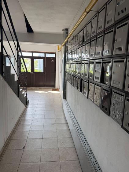 Ap 3 camere - rezultat din alipirea a 2 garsoniere - 62 mp - parter - 23