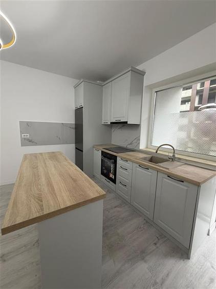 Apartament cu 2 camere decomandat, mobilat în Tractorul