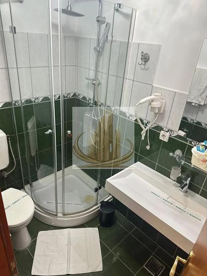 Casă cu 14 camere cu Teren 750 Mp în Central