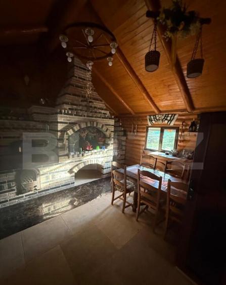 Cabana din lemn rotund, 2 camere, 140 mp, teren 2800 mp, Pal - 2