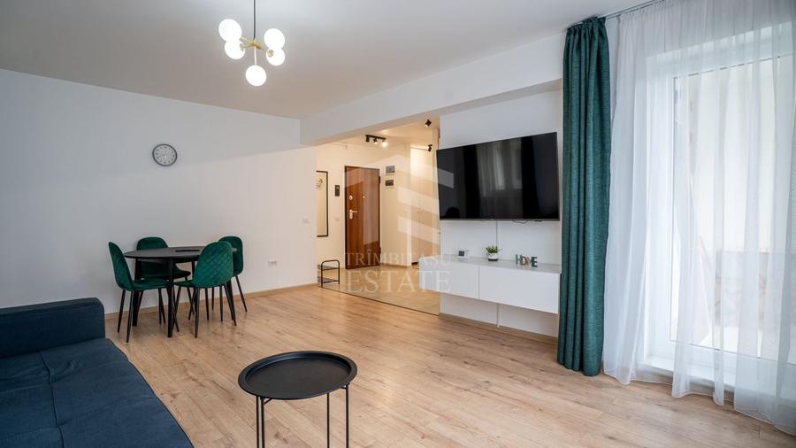 Apartament cu 2 camere semidecomandat, mobilat în Tractorul