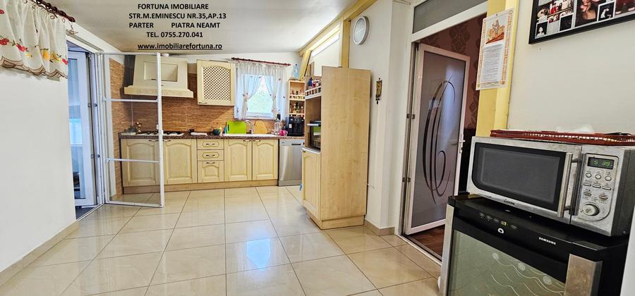 Locuinta individuala(apartament 4 camere)+spatiu comercial si teren ,Darmanesti - 3