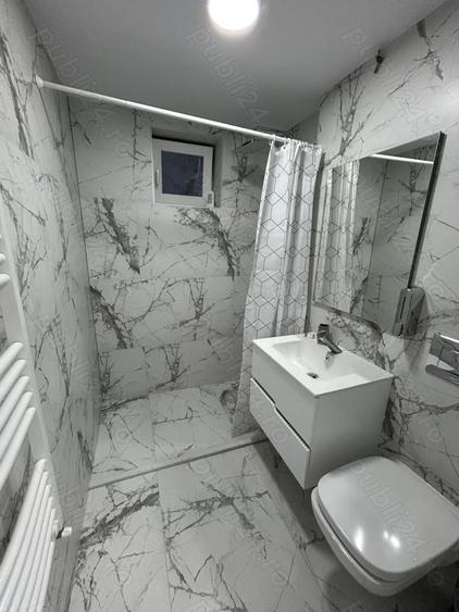 Inchiriez apartament central parter cu 3 camere - 4