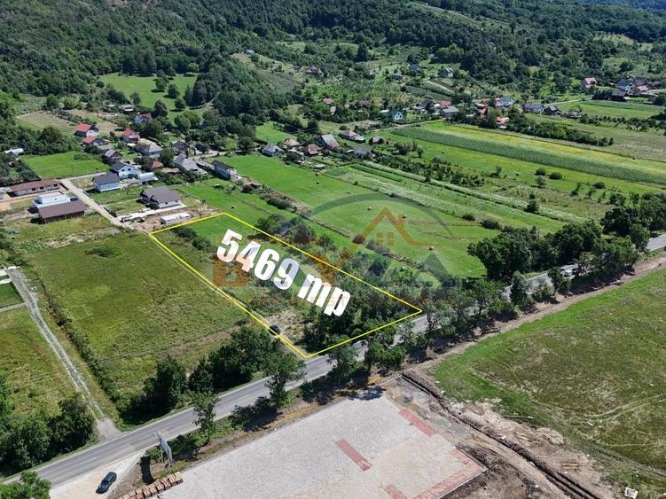 Teren intravilan - 5.469 mp, cu deschidere 44.4 m la DN1C - Cicârlău, Maramu - 4